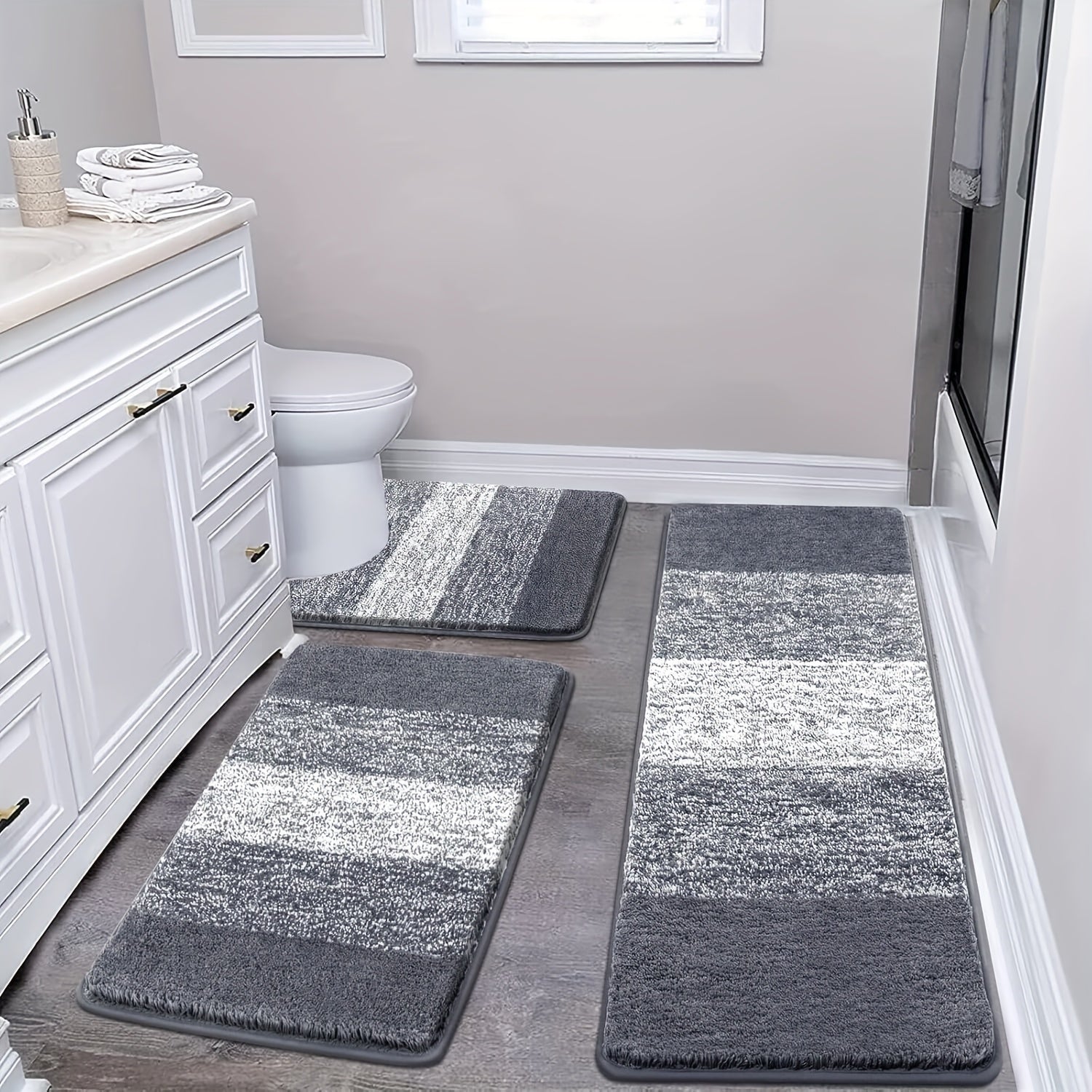 Set of Three Bathroom Rugs Made of Microfiber, Featuring Non-Slip Mats, Soft Shaggy Textures, And Runners. They Are Machine Washable And Come in Sizes 18\