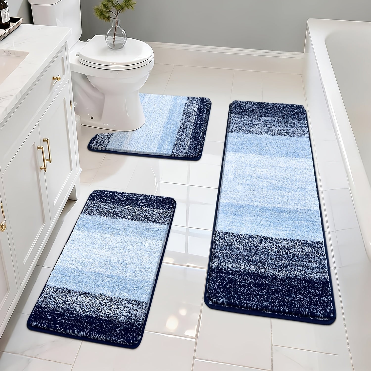Set of Three Bathroom Rugs Made of Microfiber, Featuring Non-Slip Mats, Soft Shaggy Textures, And Runners. They Are Machine Washable And Come in Sizes 18\